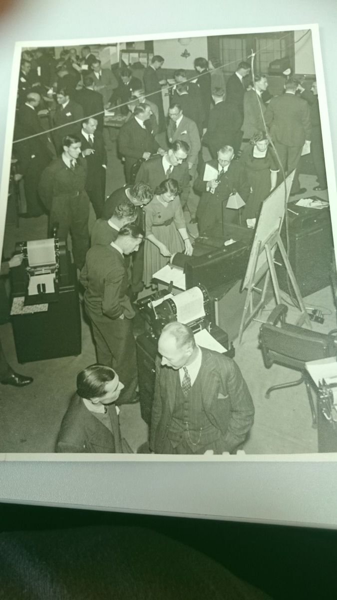 Archive photograph of a crowded office equipment exhibition floor